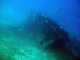 The Our Confidence Wreck off Harbour Village House Reef